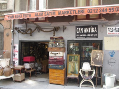 Antique shop with vintage suitcases and chair