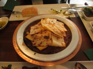 plate with sauce and flat bread