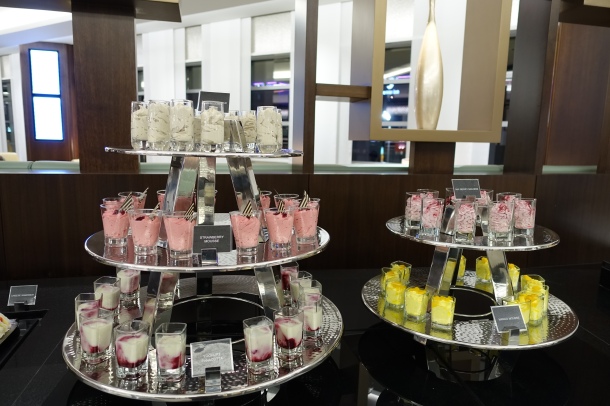 3 tiered stand of mousse shots in the Etihad lounge in Abu Dhabi
